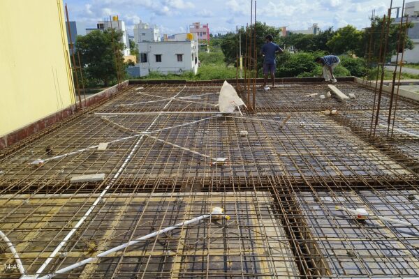 Skilled civil construction team working on residential building site