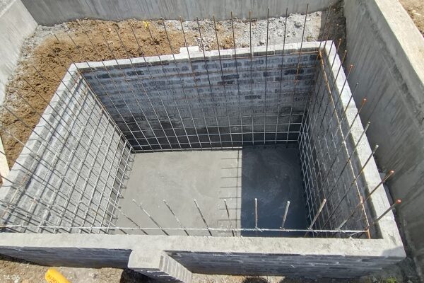 Skilled civil engineers managing building construction work on-site