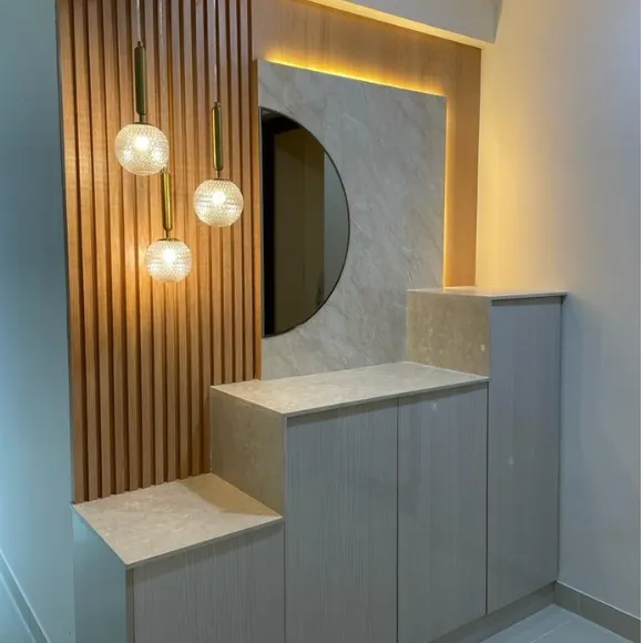 Modern wardrobe interior with built-in LED lighting and premium storage design