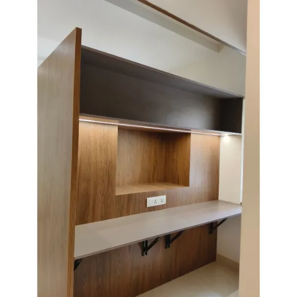 Modern TV unit with custom wooden panels and built-in storage