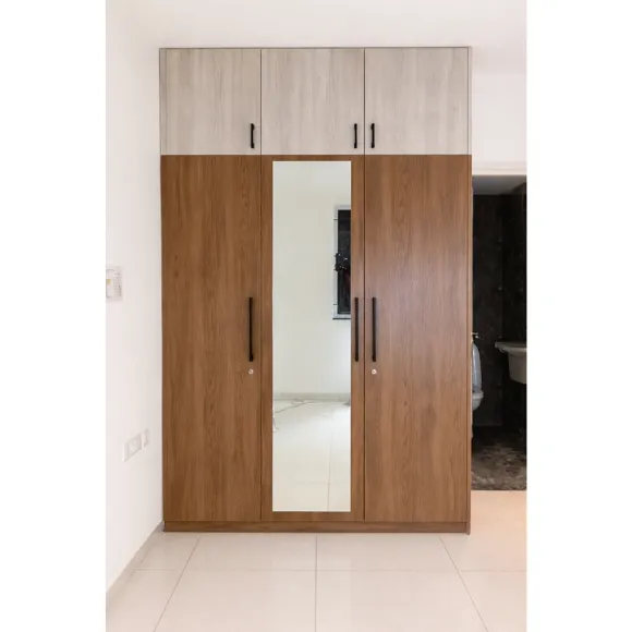 Modern bedroom wardrobe with custom storage and sleek finish