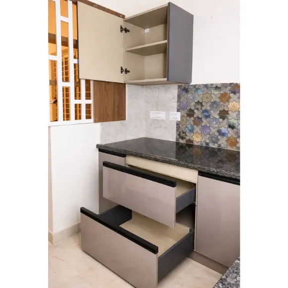 Modern kitchen pantry with custom storage cabinets and organized shelves