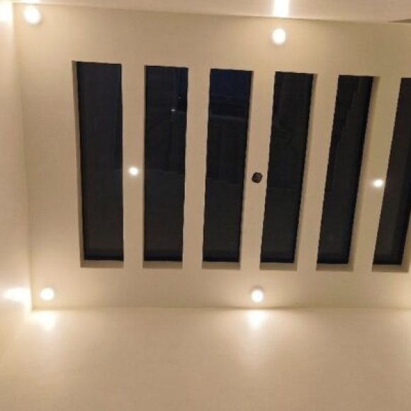 Professional exterior painting work for commercial building facade