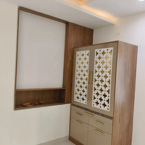 Modern wooden pooja unit with elegant carved design for home interiors