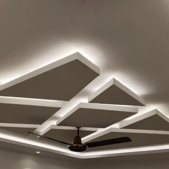 Elegant false ceiling featuring ambient LED lighting for modern homes